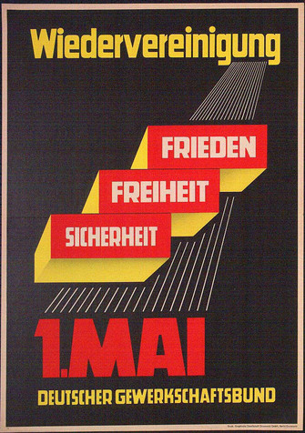 Maiplakat 1959. Text: Wiederverienigung darunter drei Quader mit Text 'Frieden, Freiheit, Sicherheit' und Text unten 1. Mai Deutscher Gewerkschaftsbund 